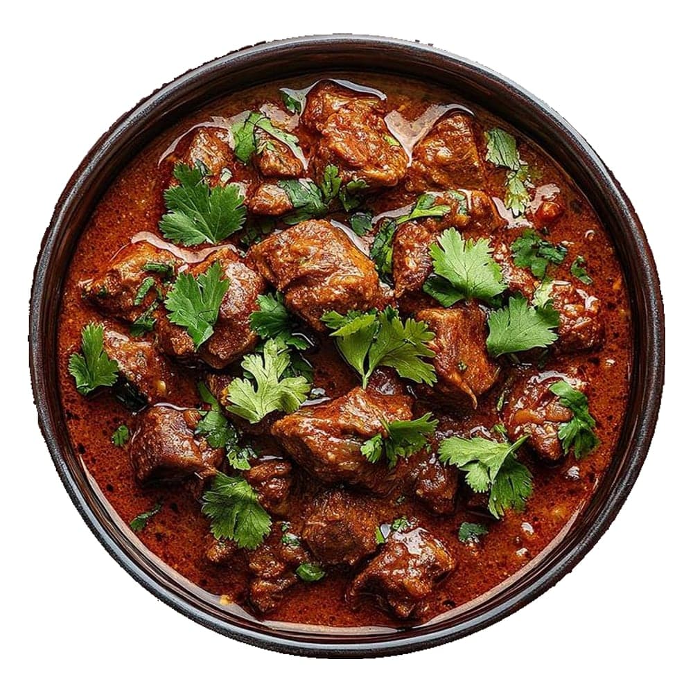 Bowl of spicy mutton curry garnished with fresh coriander