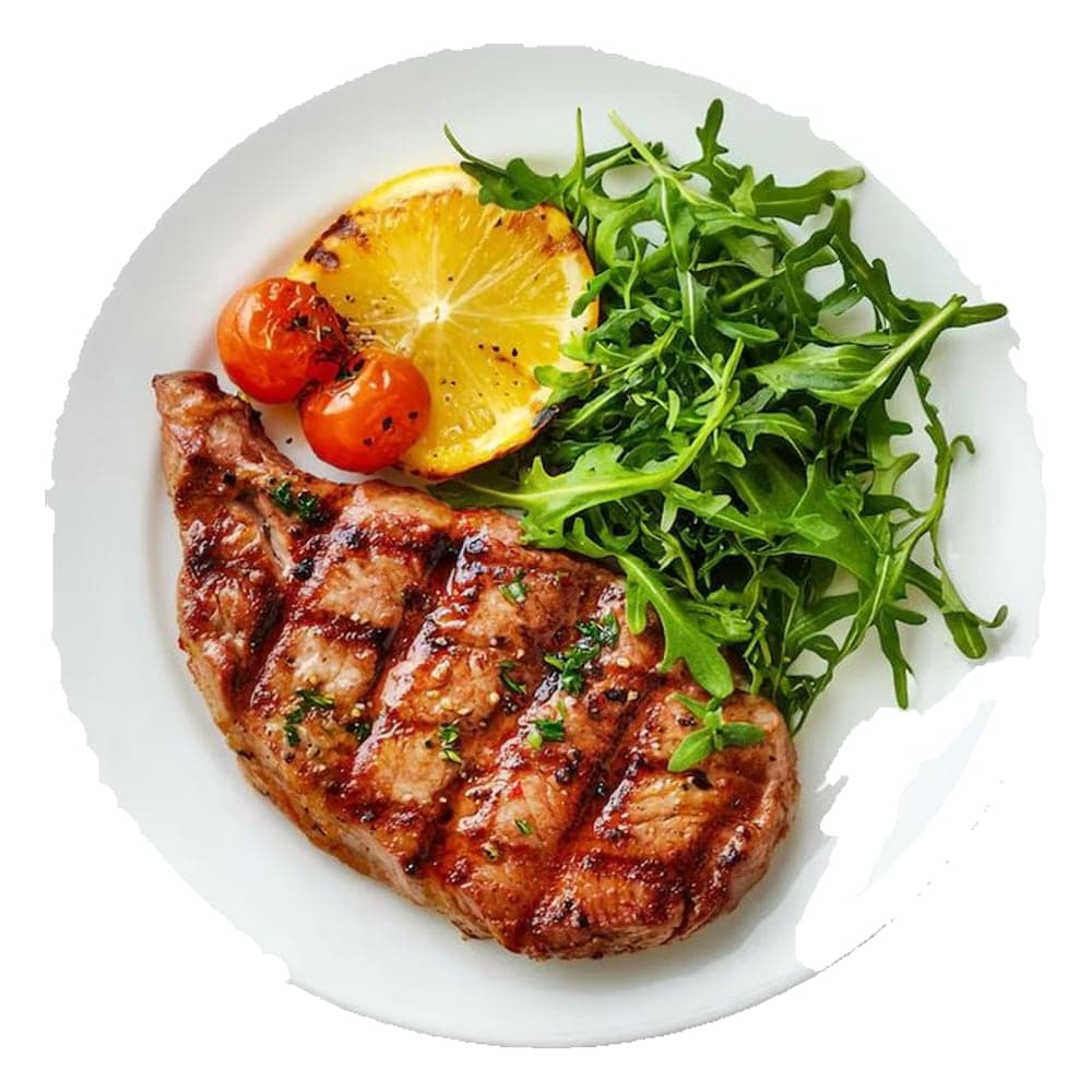 Grilled steak with rocket salad, cherry tomatoes and grilled lemon